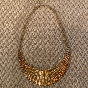Gold colored necklace